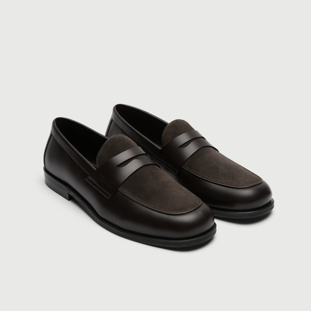 Walk London Grosvenor Saddle Loafers in Dark Brown Leather and Suede three quarter view showing suede vamps and leather saddle strap with cut out