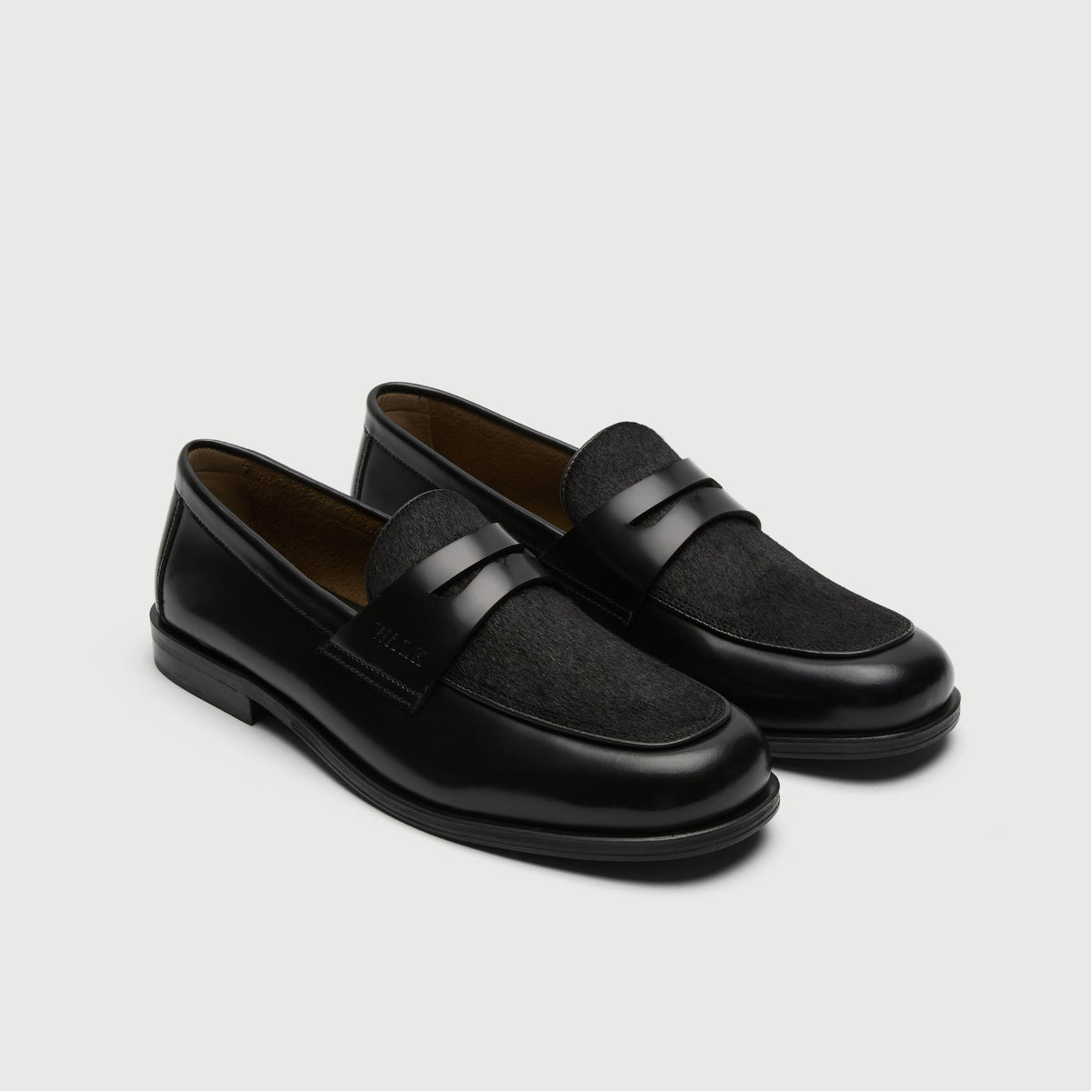 Walk London Grosvenor Saddle Loafers black leather with black pony hair vamp three quarter view