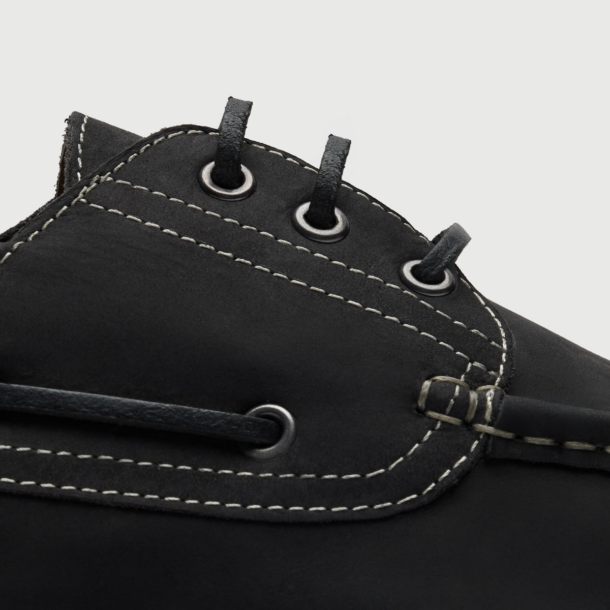 Walk London Hackney Boat Shoe in matte charcoal black leather with contrast stitch close up view showing leather laces and eyelets
