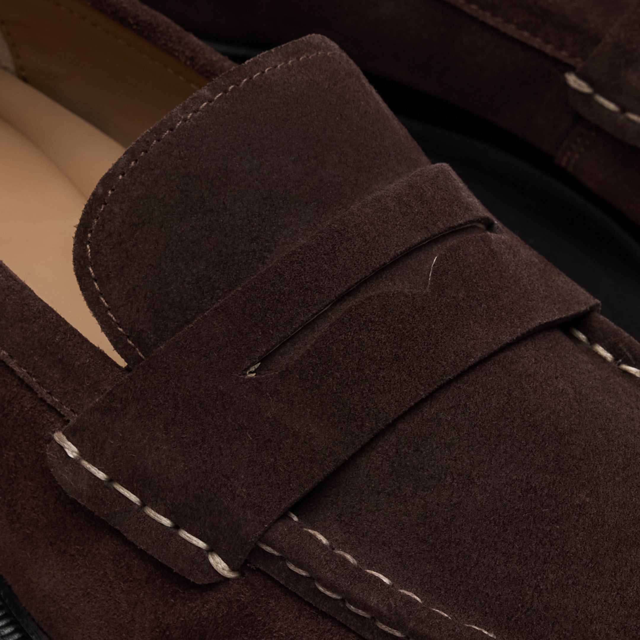 Walk London Hackney Brown Suede Saddle Loafer close up view of cut out section in saddle strap and contrast stitching