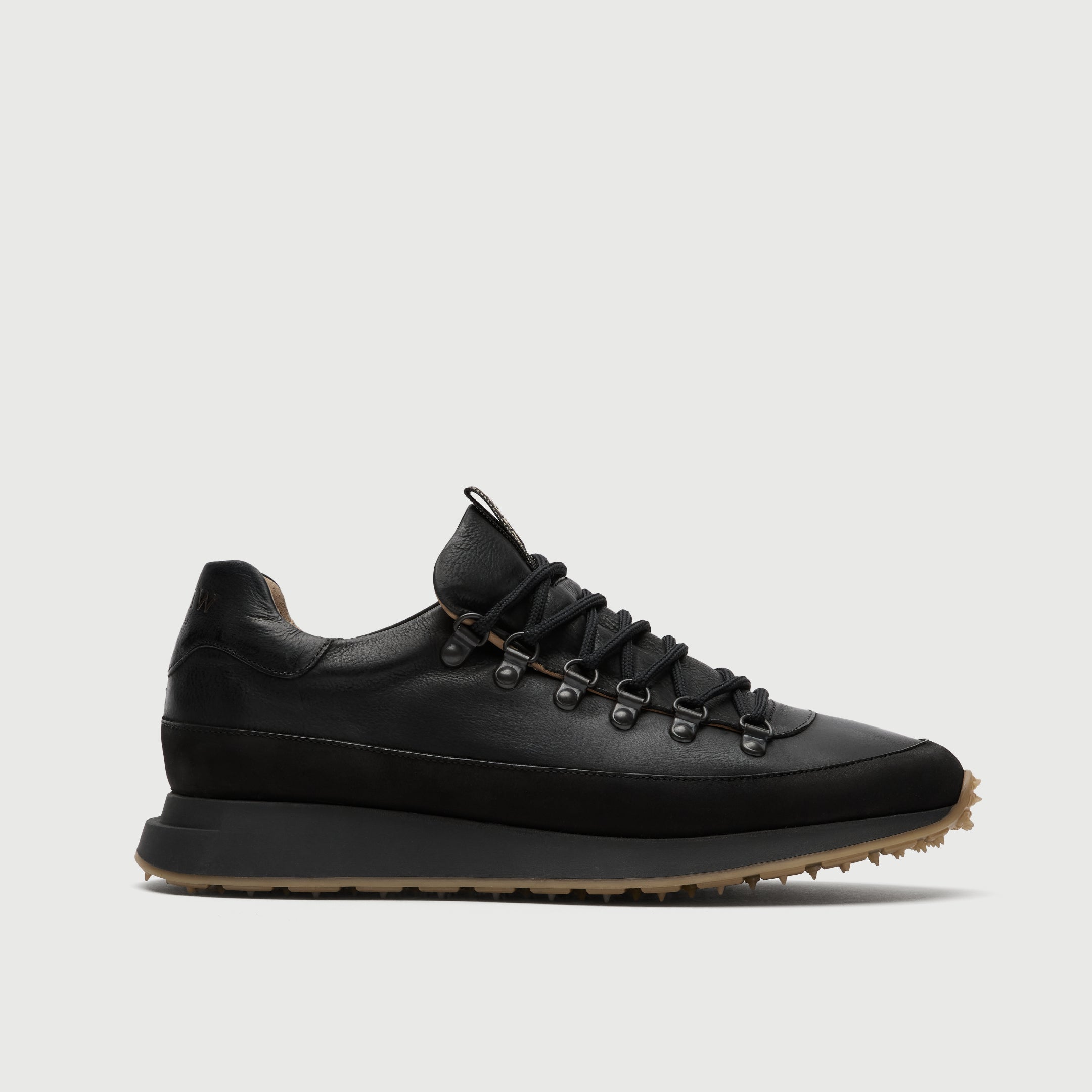 Black leather walk london hampsetad hiking sneaker on a light grey background