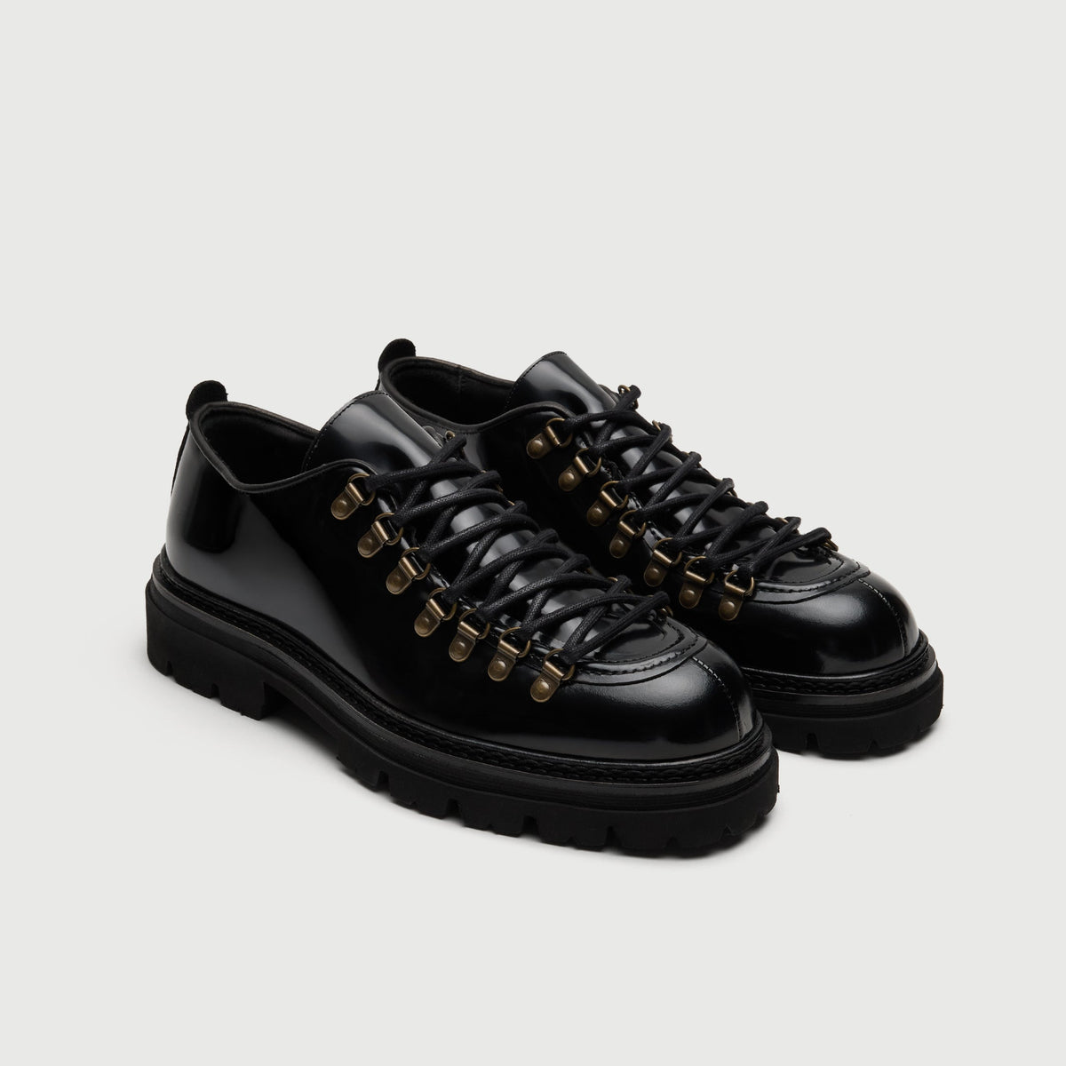 Walk London Hartford Hiking Style Shoes in black smooth leather three quarter view showing d-ring hardware and black laces
