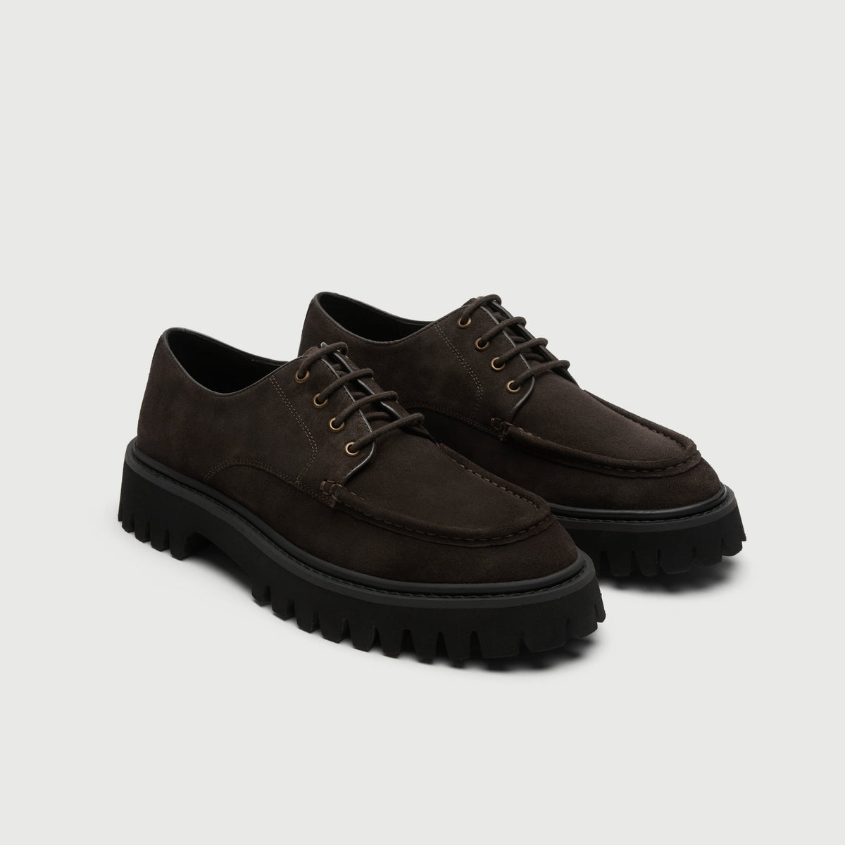 Walk London Hopper Lace Shoes in Brown Suede three quarter view showing brass toned eyelets, brown laces, apron stitch detailing, and chunky black sole