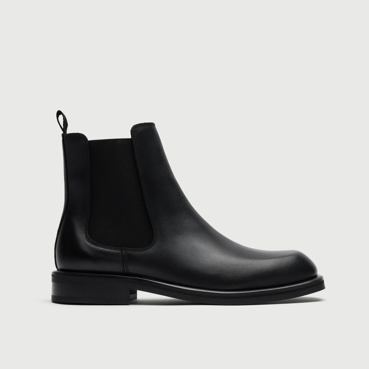 Walk London Lambeth Chelsea Boot in Black Leather side view showing elastic panel and pull tab.