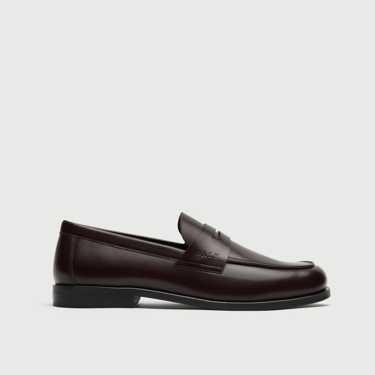 Walk London Marylebone Saddle Loafer in Dark Burgundy Leather side view showing embossed branding on the side of the saddle strap