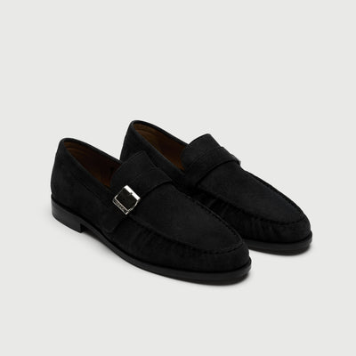 Video of man wearing Walk London Como Black Suede Loafers with buckle and wide khaki trousers