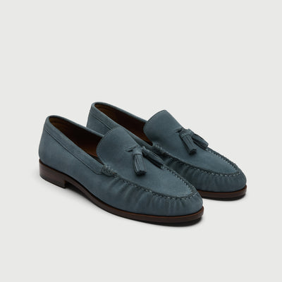Video of man wearing Walk London Como Tassel Loafers in Blue Suede with  cream trousers