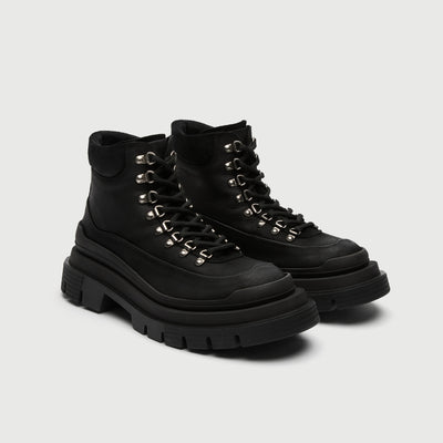 Walk London pair of black Highgate hiking boot with thick sole on a light grey background