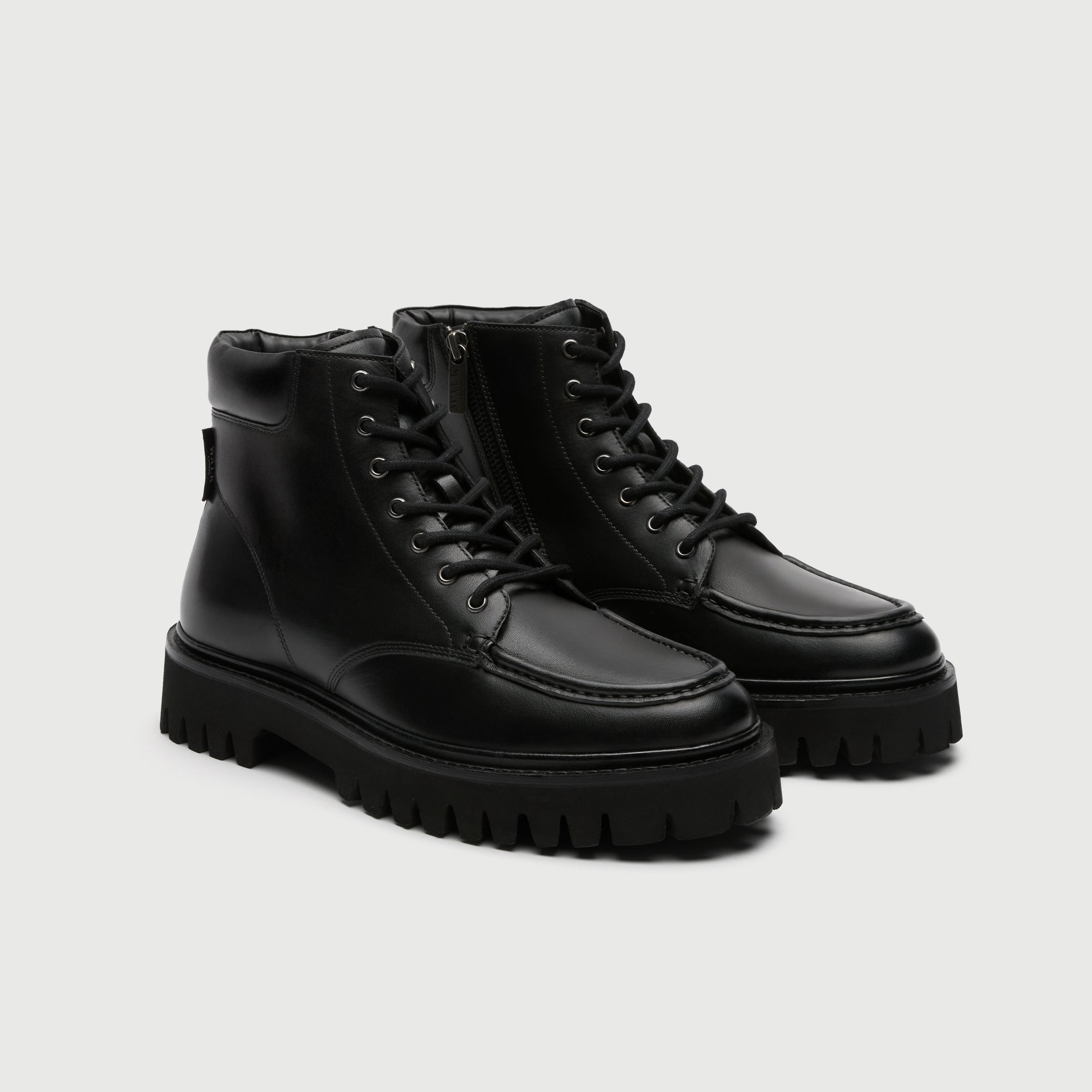 Walk London - Pair of Hopper Apron Black leather boot on a light Gray background