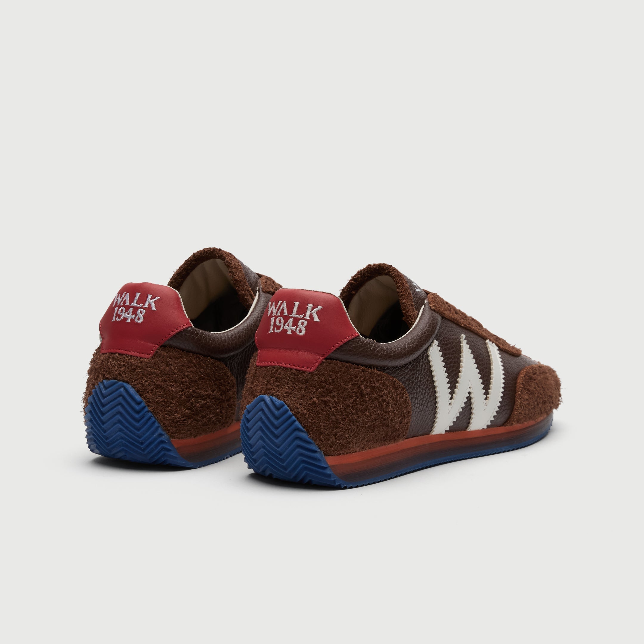 Walk London Retro Runner Trainers in Brown Brushed Suede and Grain Leather heel view showing red heel counter with white WALK 1948 embroidered and blue ridge sole extending into heel guard