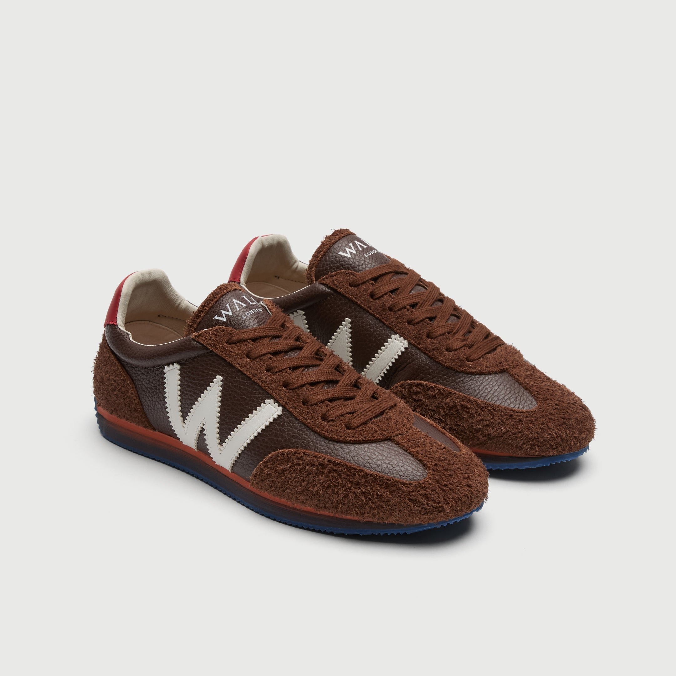 Walk London Retro Runner Trainers in Brown Brushed Suede and Grain Leather three quarter view showing flat brown lace, off-white lining and white branding on tongue