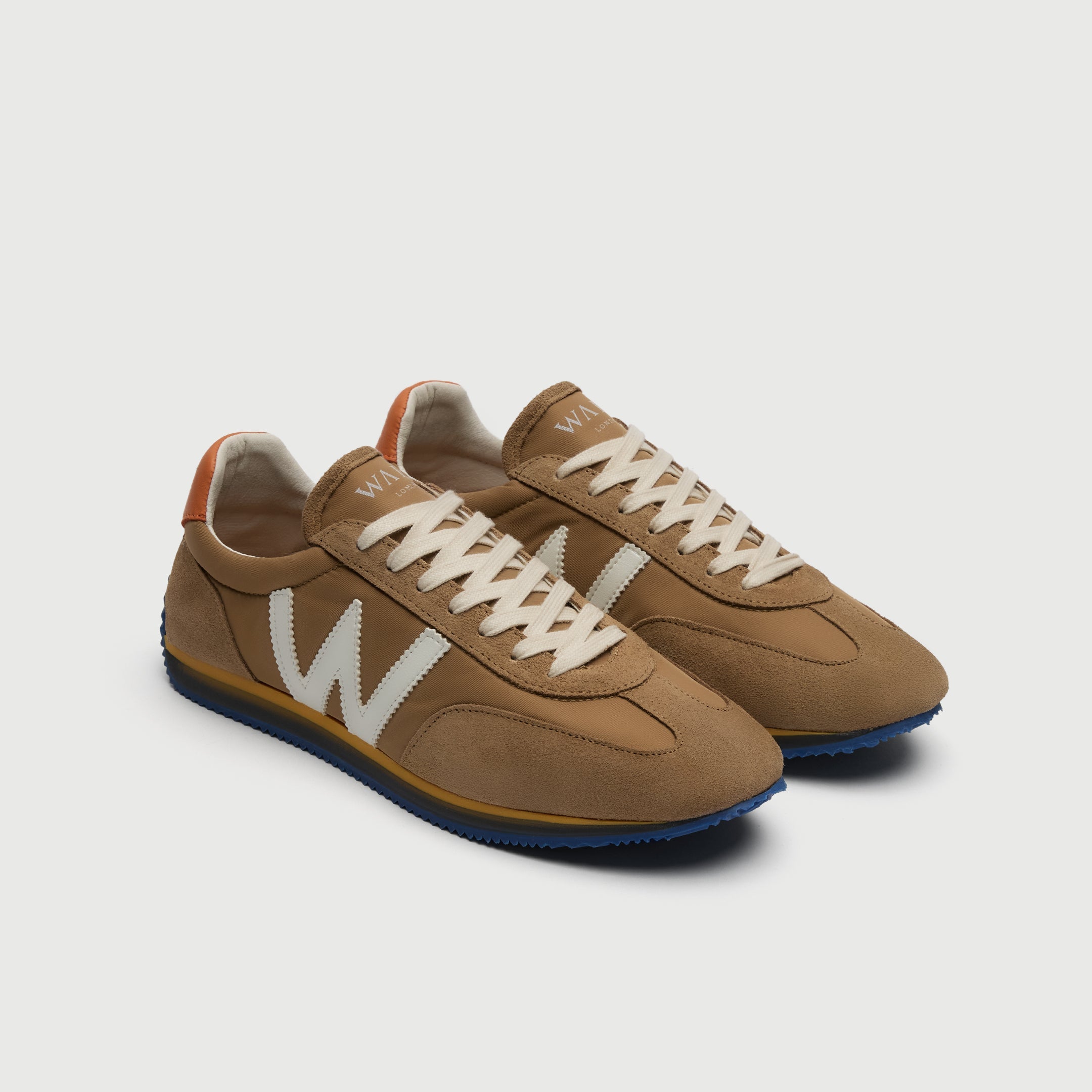 Walk London Retro Runner Trainer in Stone suede and textile with white W and laces three quarter view