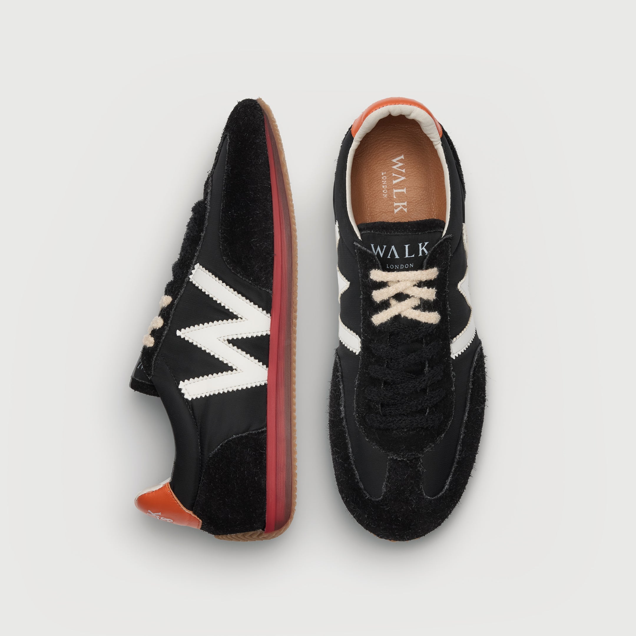 Walk London Retro Runner Trainers in Black Brushed Suede and Textile top and side view, half with white hairy lace and half with black hairy lace
