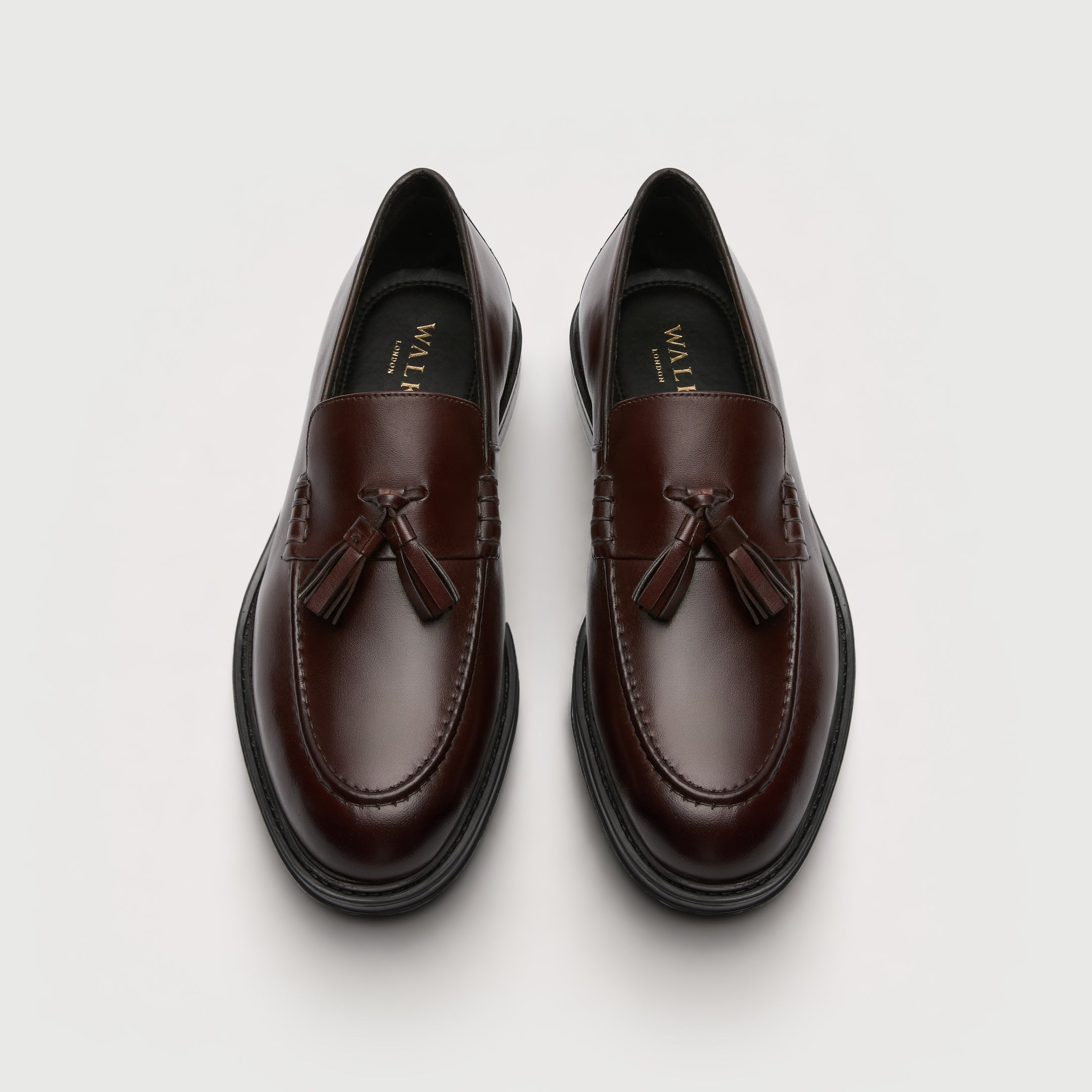 Walk London Richmond Tassel Loafers in Brown Leather top view showing rounded toe shape and gold foil branding on black insoles