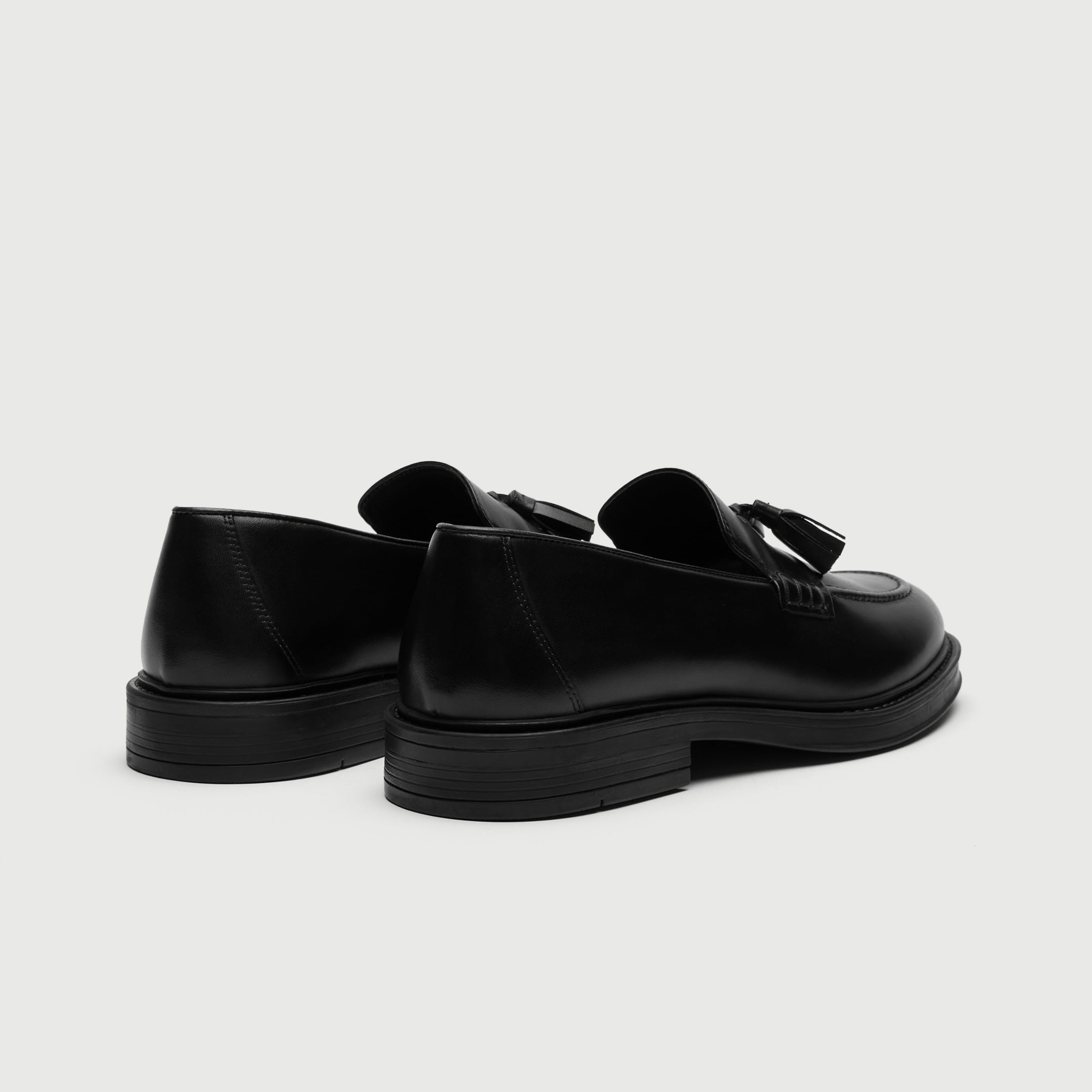 Walk London Richmond Tassel Loafers in Black Leather heel view