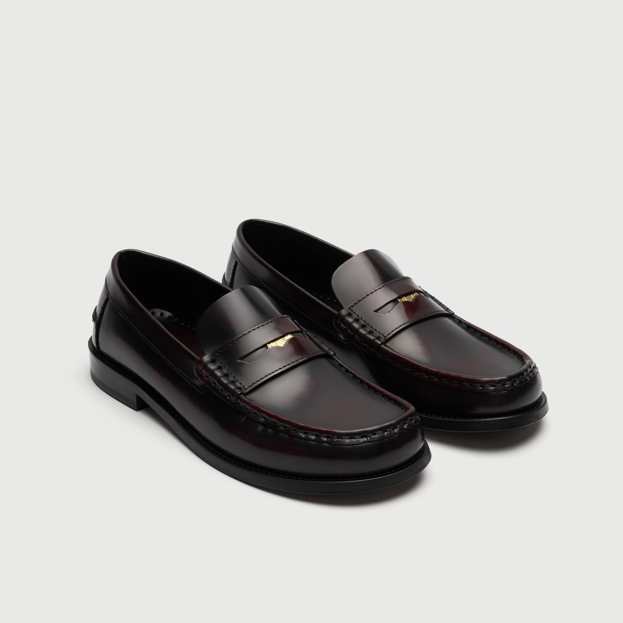 Walk London Shoreditch Penny Loafers in Burgundy Leather showing gold penny stored in the saddle strap